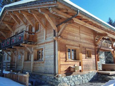 luxury chalet morzine with snow and blue sky